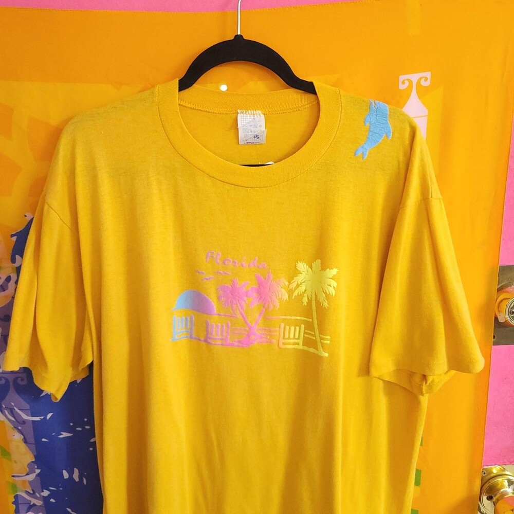 Vintage 90s Florida T-shirt with pink & blue palm trees and beach scene graphic